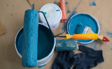 Paint bucket with roller, glove and brush